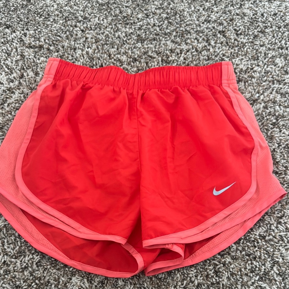Nike Red Athletic Shorts with Curved Hem